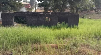 Lot with Unfinished House